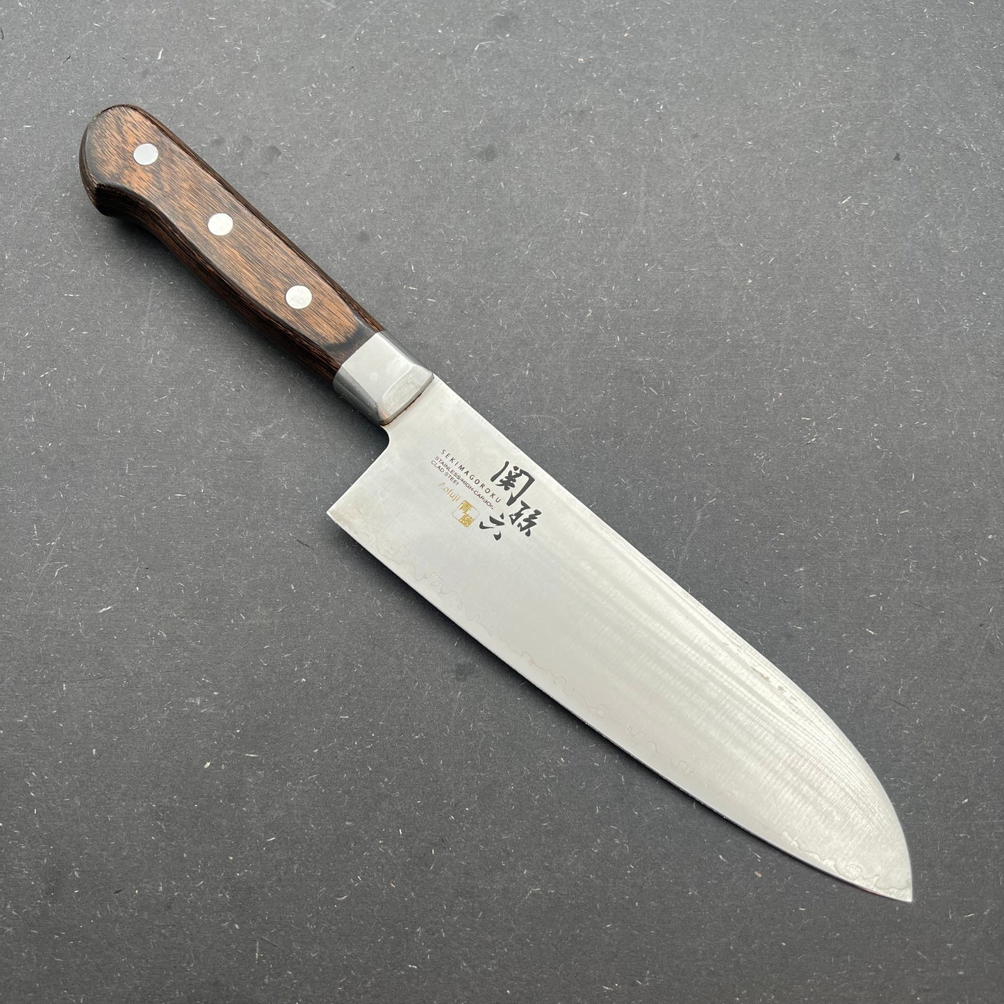 Kai Santoku 170mm rustfri